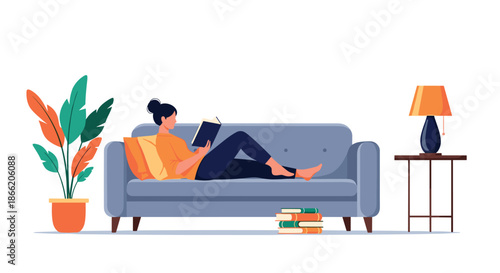Young woman relaxing on a comfortable sofa while reading an interesting book in a peaceful living room setting.