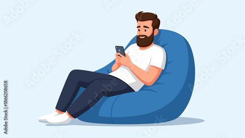 Relaxed Bearded Man Engaged in Digital Communication While Comfortably Sitting on a Blue Bean Bag Chair, Browsing Content on His Smartphone
