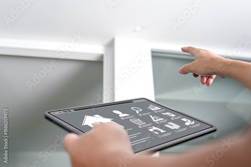 House inspection concept, Man using tablet to check home condition online, building design verification, engineer approval, utilities system inspection, property insurance assessment, quality control