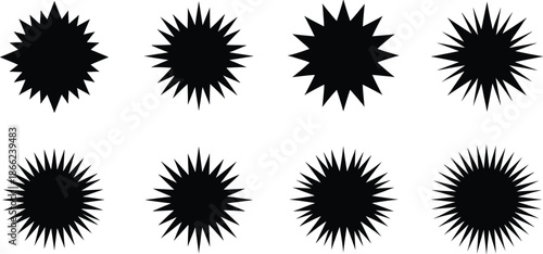 Collection of eight sharp black starburst shapes with pointed rays, isolated on a clean white background, perfect for graphic design elements and abstract patterns.