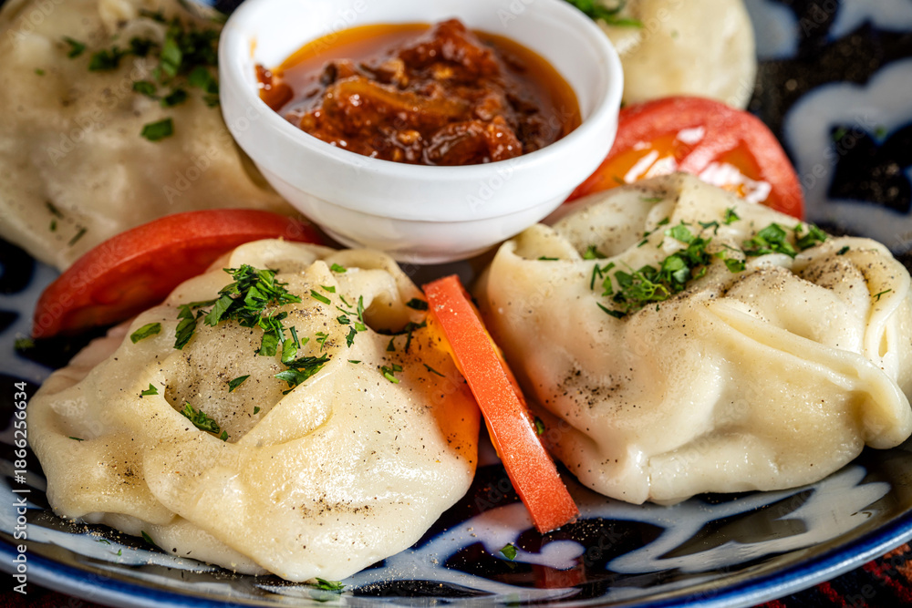 Ταπετσαρία Traditional Uzbek Manti Dumplings With Rich Sauce