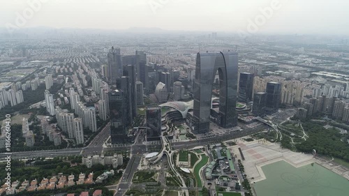China real estate development - drone flight of modern skyscraper in urban landscape of Suzhou city