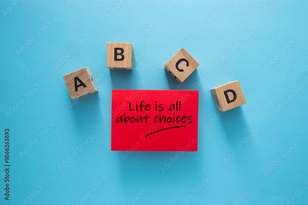 Fototapeta premium Red sticky note saying life is all about choices