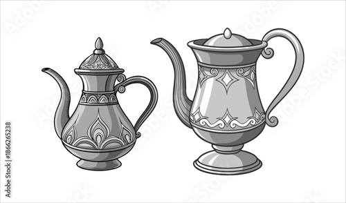 Two ornate, vintage-style teapots with decorative patterns and elaborate handles, isolated on white