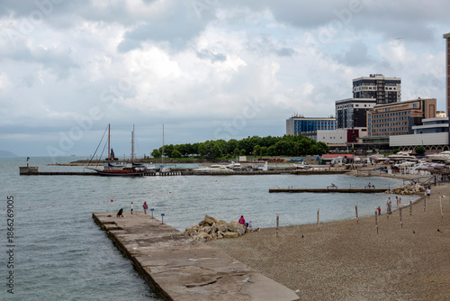 July 28, 2025: Yacht parking along the waterfront in Novorossiysk, Russia, with moored yachts near the coastline, reflecting maritime life and the Black Sea harbor atmosphere