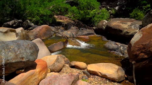 Mountain river. Rocks and boulders of the mountain river of the BOHO waterfalls near Nha Trang in Vietnam. Video with sound. 