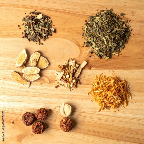 Wallpaper Mural Assortment of various dried herbs, roots and fruits on wooden surface Torontodigital.ca