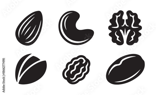 dry fruits silhouette icons set with almonds cashews walnuts and nuts