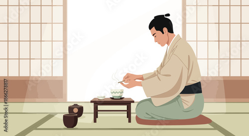 Japanese man in traditional kimono attire performing a formal tea ceremony.
