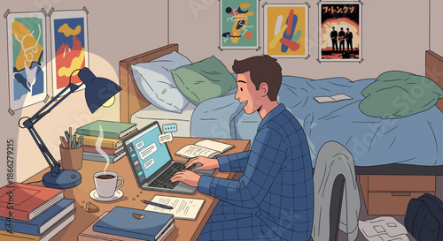 Young man in pajamas smiling while working on his laptop at night.