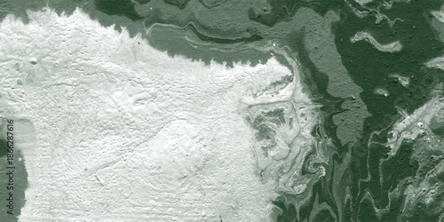 Abstract textured background with a marbled effect in dark green and white, showing organic swirls and granular textures for artistic and decorative purposes