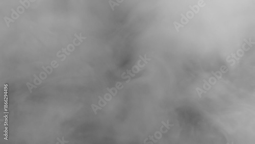 A smoky and mysterious atmosphere. The image is filled with a dense, swirling cloud of gray smoke