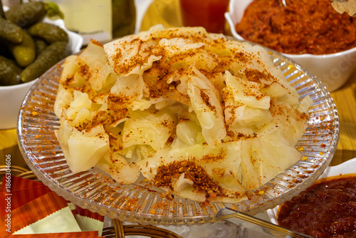 Sauerkraut finely cut raw cabbage fermented by various lactic acid bacteria and sprinkled with red pepper