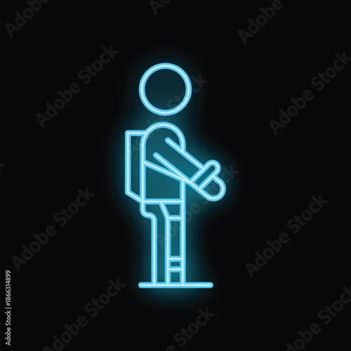 Neon sign showing a schoolboy wearing a backpack and holding a book in his hand, on black background