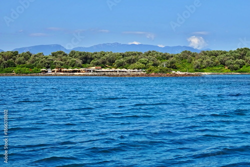 Greece - view from a boat on the seacoast of Monolia island with Lichadonisia beach