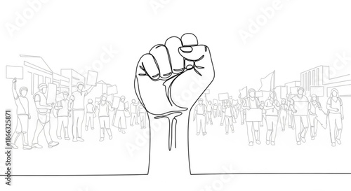 Fist raised in protest symbolizing strength and unity with crowd in background  
