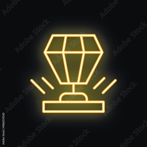 Yellow neon sign representing a big shining diamond, on a black background, ideal for gambling, luxury or jewelry themes
