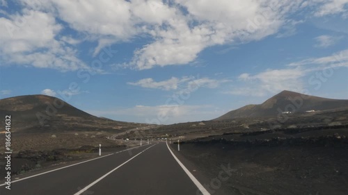 The road that crosses La Geria area, Lanzarote, Canary Islands, Spain