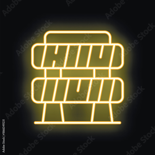 Yellow neon sign of a roadblock with stripes glowing on a black background