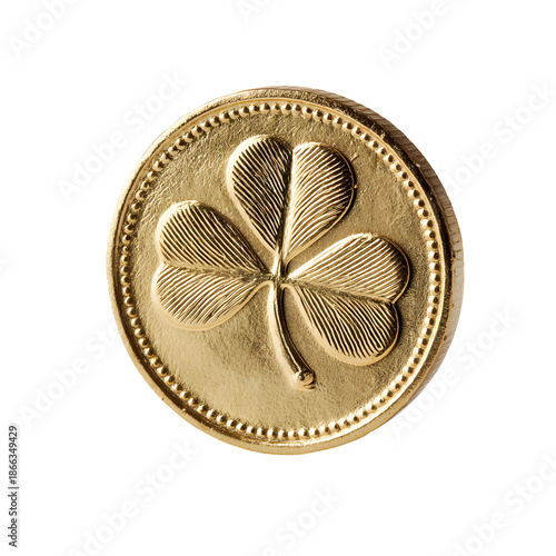 A golden coin featuring a detailed four leaf clover design on black background
