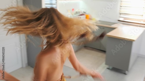 lively blonde woman dancing happily carefree blonde woman joyfully twi