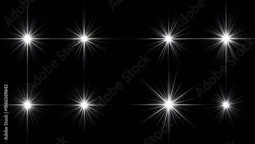 Eight bright white starburst lights on a black background