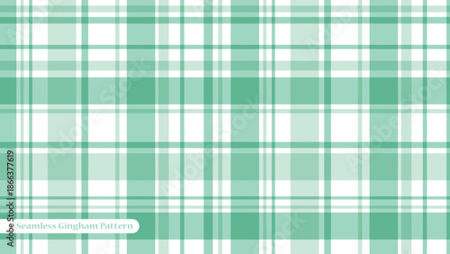 Green and white plaid pattern with intersecting lines and squares in various shades of green on a white background for design and texture with fabric