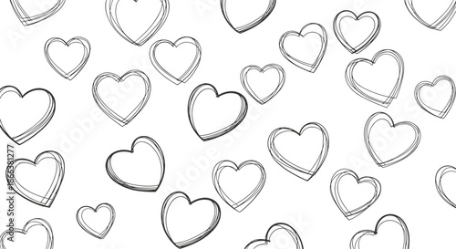 A romantic seamless pattern of hand-drawn, scribbled black and white hearts of various sizes on a white background.