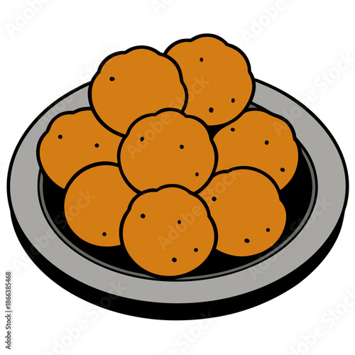 Plate of golden fried bhaji fritters arranged ready to eat