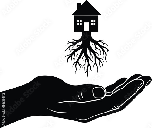 Hand holding house with roots symbolizing real estate foundation