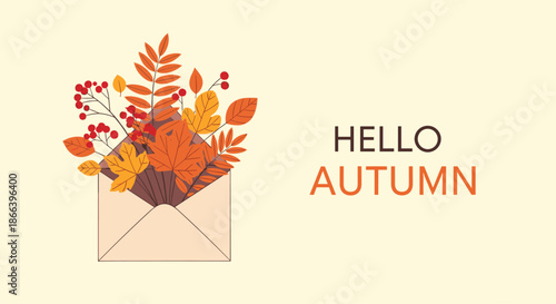 Open envelope overflowing with various autumn leaves and red berries next to the greeting hello autumn on a soft cream background.