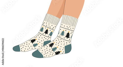 Pair of cozy white socks featuring a festive pattern of black and green christmas trees with tiny stars worn on a person legs.