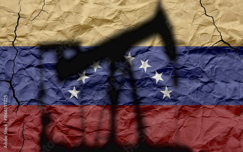 Oil pump silhouette in front of a textured and cracked Venezuelan flag. Venezuelan oil concept and economic crisis.