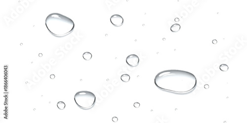 Various water droplets and small bubbles scattered across a bright white background