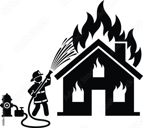 Firefighter putting out fire in burning house