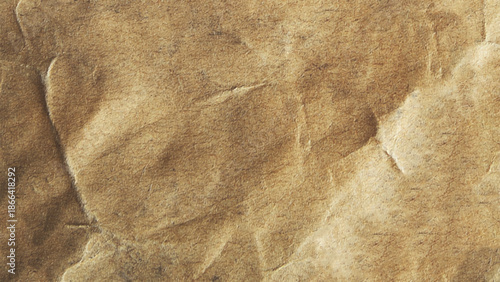 Abstract wrinkled wrinkled texture of wrapping brown paper