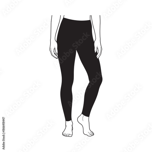 Woman wearing black leggings standing with feet apart