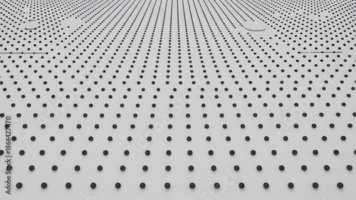 A precise grid of small black circular pegs arranged uniformly on a bright white flat surface receding into an abstract infinite background under soft even stud