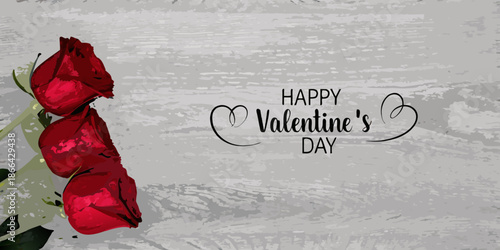 Red roses and valentine s day greeting on a textured gray background