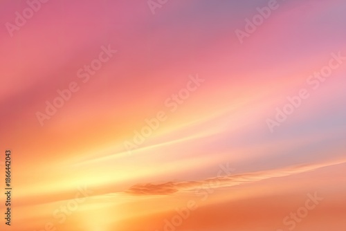 Softly colored sky with streaks of light during sunset