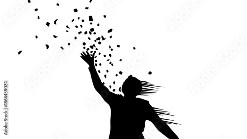 A silhouette of a person joyfully tossing confetti into the air, symbolizing celebration and freedom