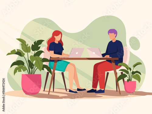 Two colleagues sitting at a desk with laptops and plants around them in a modern workspace with a green background