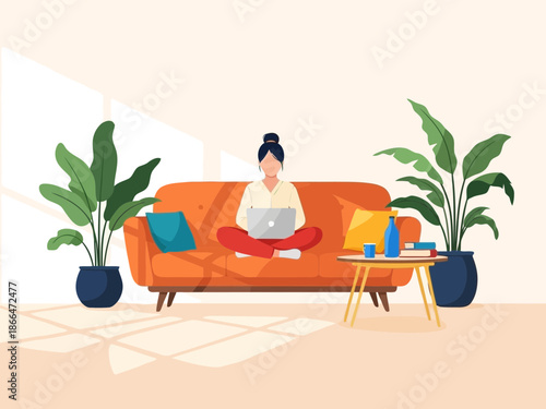 Woman sitting on couch with laptop and plants around her in a modern living room setting with warm lighting
