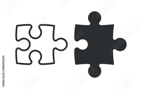 A simple illustration depicting two jigsaw puzzle pieces one black and one white seemingly disconnected and awaiting completion high quality