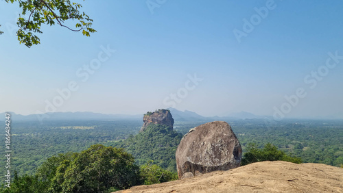 Iconic Sigiriya Rock surrounded by lush greenery. Sri Lanka.