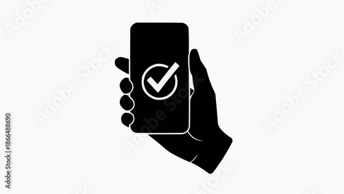 Hand holding smartphone with checkmark on screen