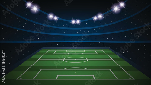 A blurry soccer stadium with green field and bright lights