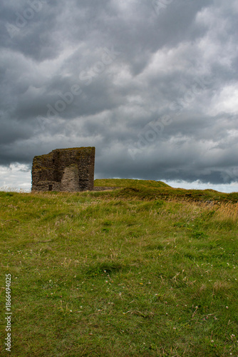 Scotland, Uk: panoramic view of the Castle of Old Wick (the Old Man of Wick), ruined castle on a spine of rock projecting into the North Sea and surrounded by sea cliffs near the town of Wick
