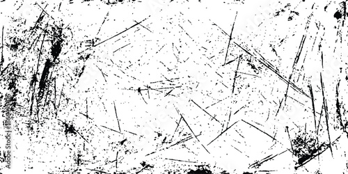A high-contrast grunge texture overlay with distressed black speckles and scratches. Abstract grunge texture with sharp black scratches and distressed lines on a white background. textured background.