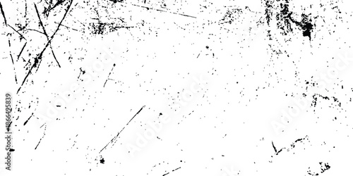 A high-contrast grunge texture overlay with distressed black speckles and scratches. Abstract grunge texture with sharp black scratches and distressed lines on a white background. textured background.